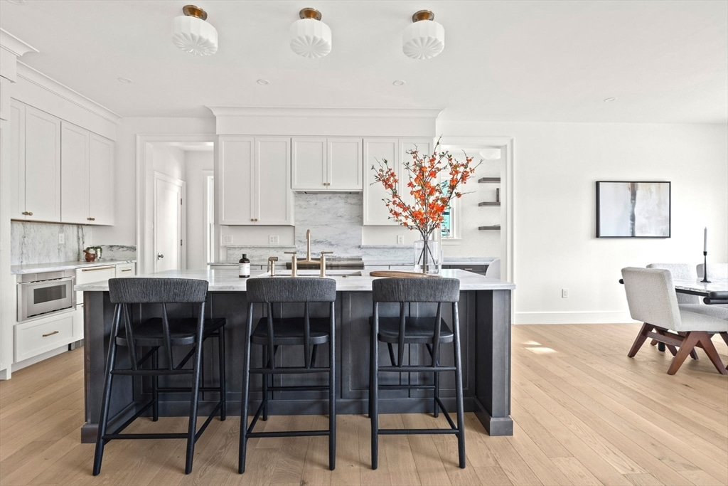 Danby Marble kitchen with white cabinets - Lexington, MA