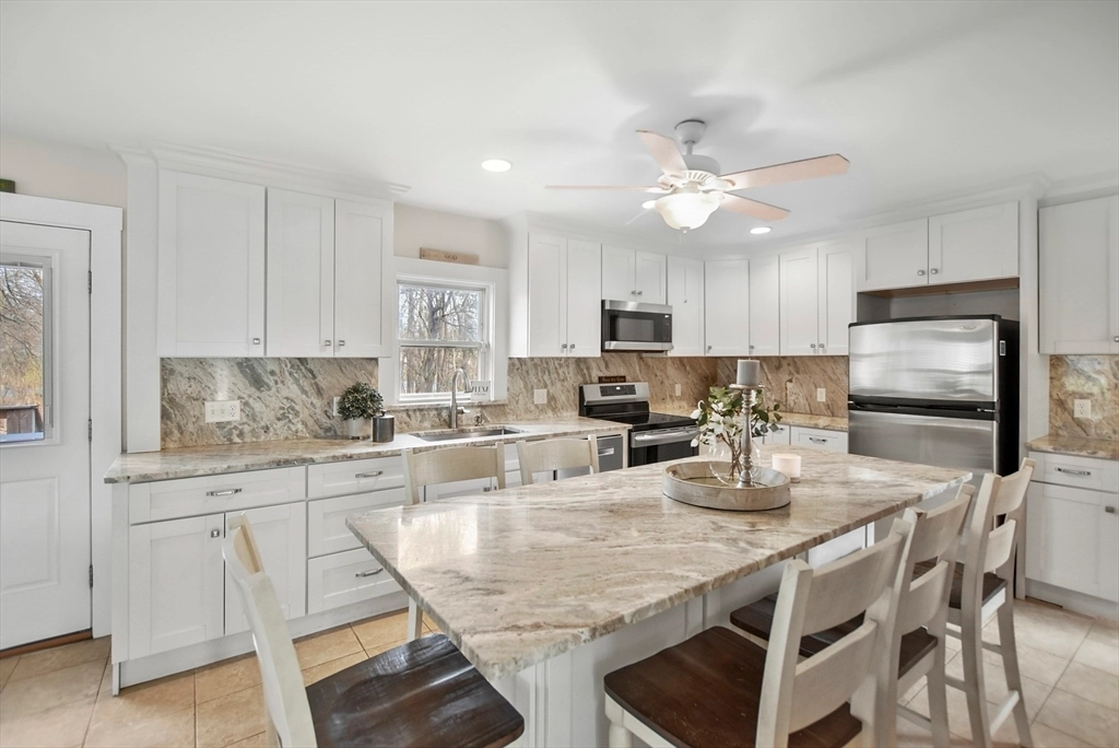 Fantasy Brown Dolomite with full height backsplash - Hudson, MA