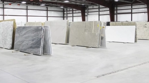 Stone gallery warehouse with various marble and granite slabs