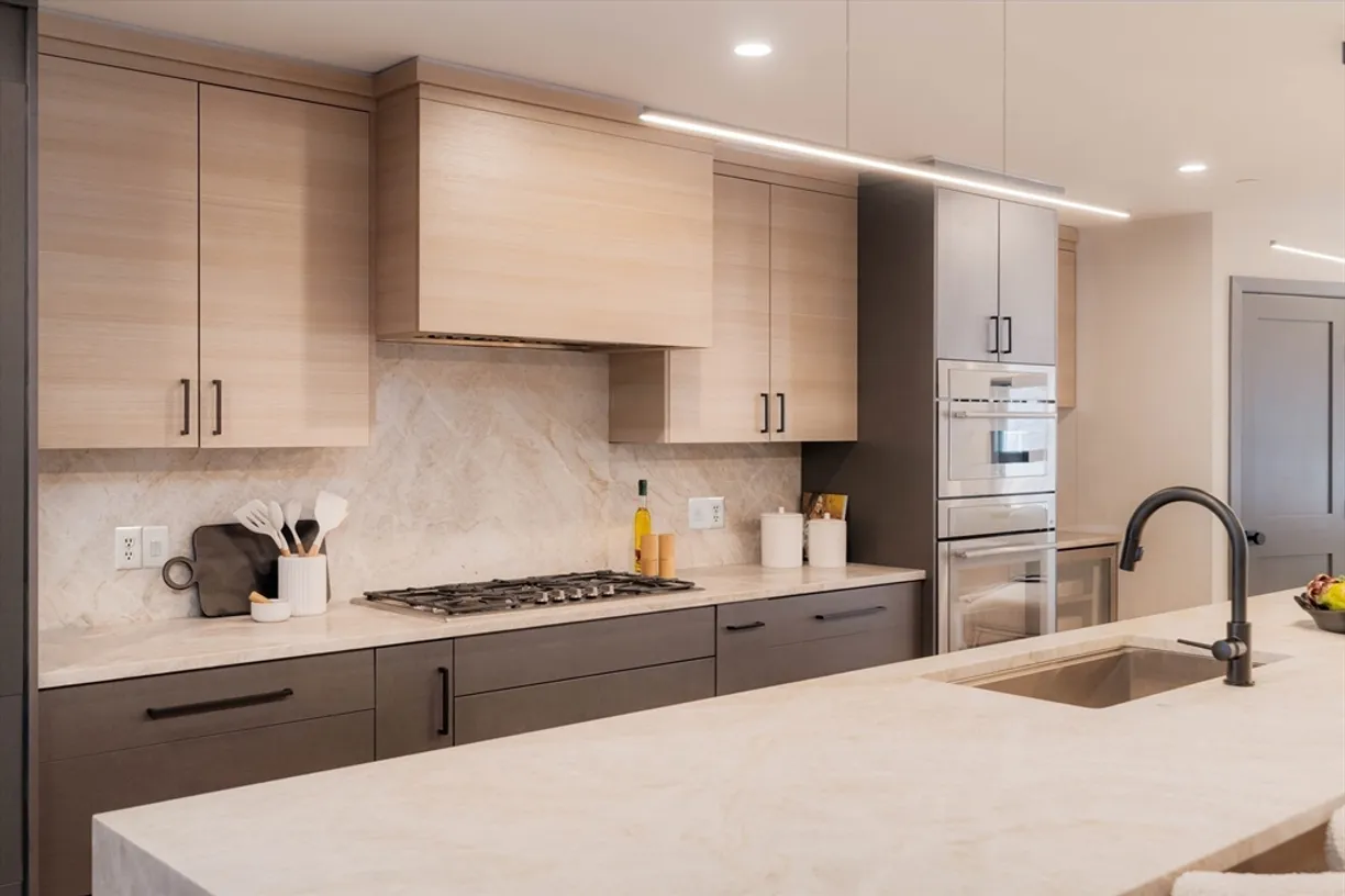 Taj Mahal quartzite full height splash - Brookline, MA